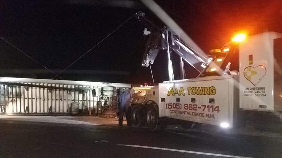 A&A Towing heavy wrecker working a night recovery near Gallup, NM